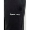 Pitkät urheiluhousut Jack & Jones JPSTKANE NORREBRO SWEAT 12282553 Musta Miehet