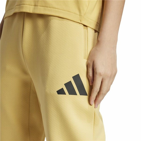 Ilgos sportinės kelnės Adidas Z.N.E. Geltona Moteris